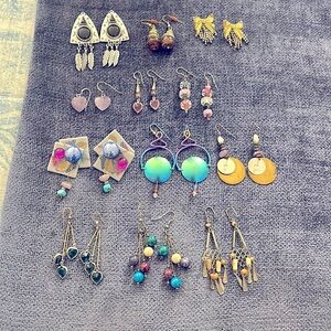 12 pair of 1980's to 1990's deco earrings.